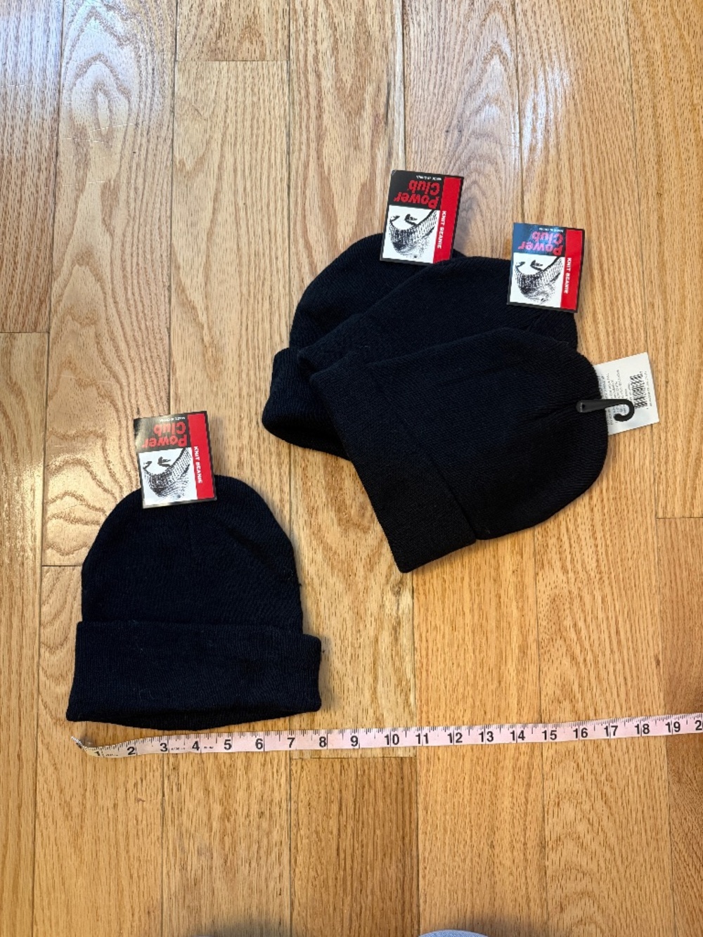 Group of Four Knit Black Beanies